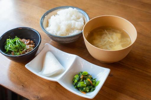 Traditional Japanese breakfast with natto, rice, and miso soup