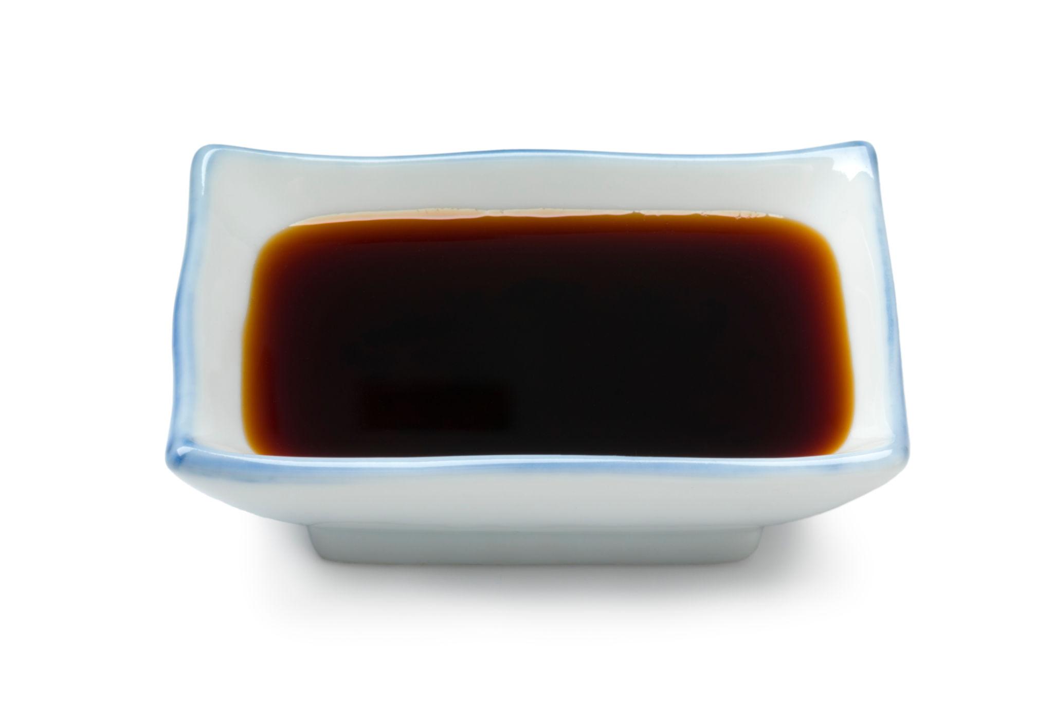 Traditional Japanese shoyu soy sauce served in a small dish